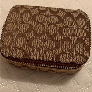 Coach pill case